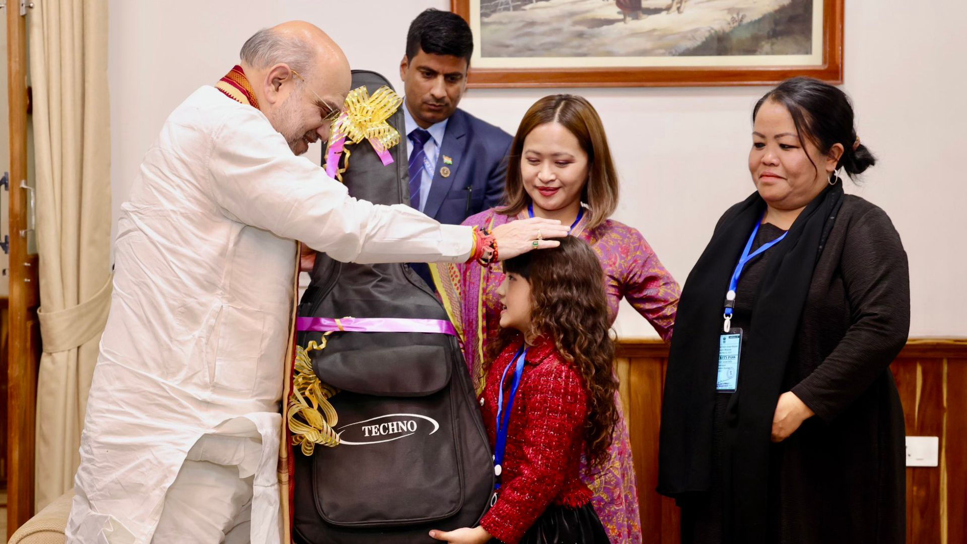 Amit Shah Gifts Guitar to Mizoram’s Young Singing Star Esther Hnamte