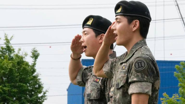 K-pop Icons RM and V Greeted by Fans After Military Discharge