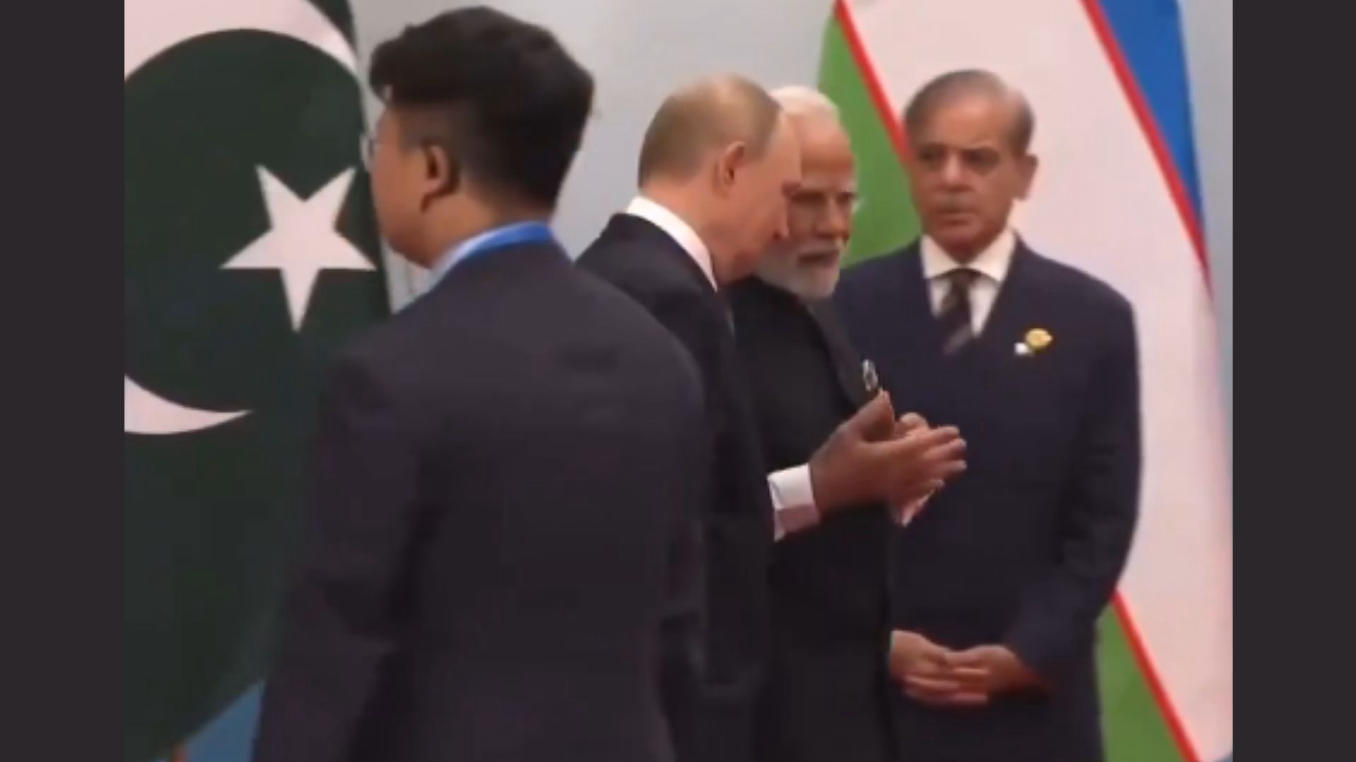 Modi, Putin Walk Together as Sharif Watches at SCO Summit Modi, Putin Walk Together as Sharif Watches at SCO Summit